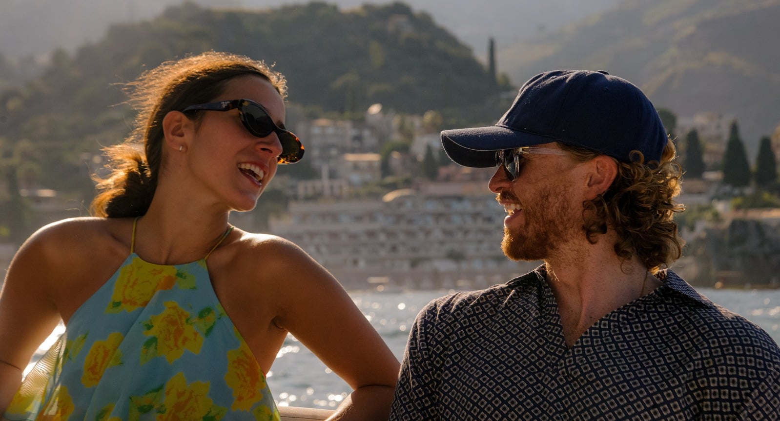 Guests enjoying the warm afternoon light on the Taormina coast
